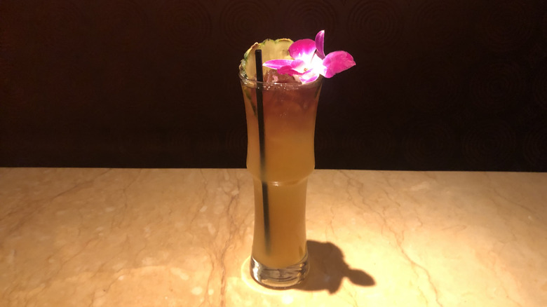 Mai Tai from Cheesecake Factory with flower garnish.