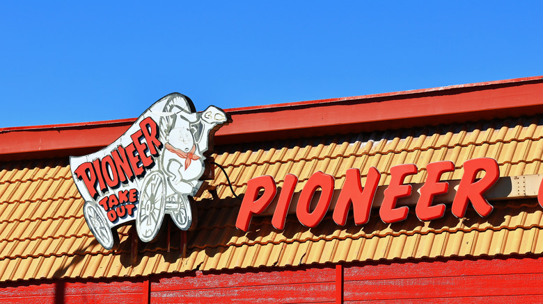 a sign of pioneer chicken takeout