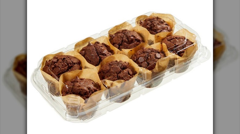 Triple chocolate muffins on a white background