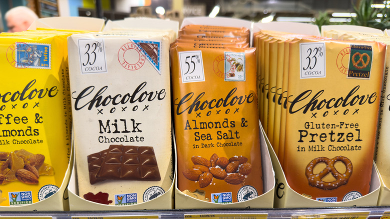 An assortment of Chocolove chocolate bars lined up on a grocery store shelf