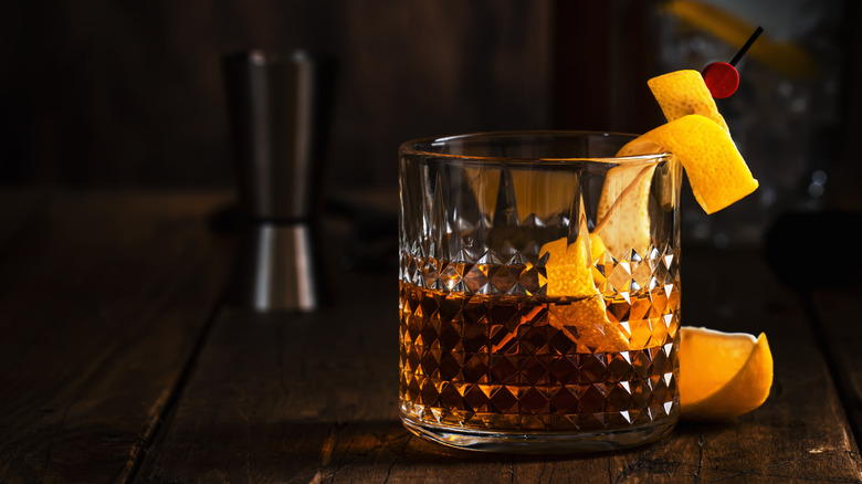 Sazerac cocktail on dark background bar