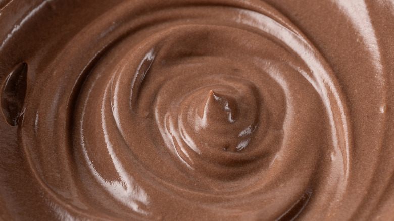Close up on swirl of chocolate pudding