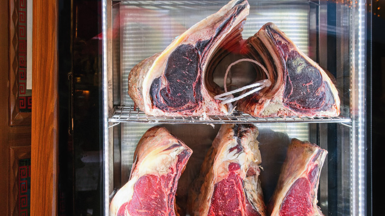 Steaks dry aging in fridge