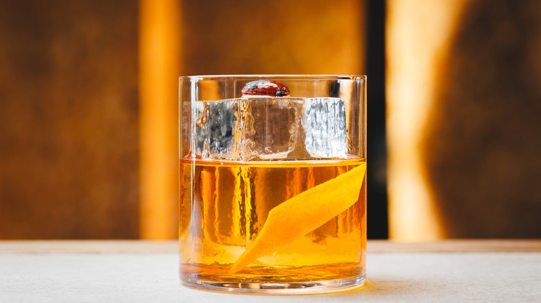 An old fashioned in a glass with ice
