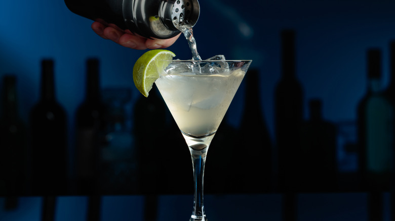 Daiquiri cocktail being poured into glass