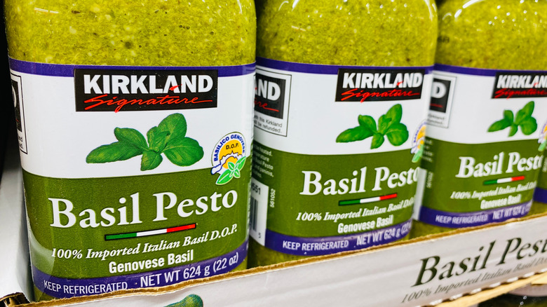 Jars of Kirkland Signature Basil Pesto on shelf at Costco