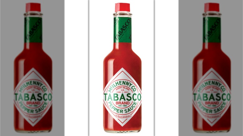 Mirrored image of tabasco pepper sauce jar with white background