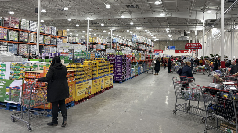 Customers shop inside Costco