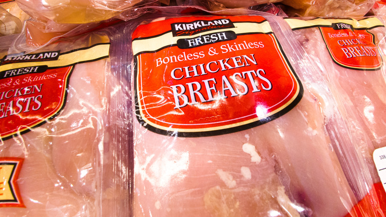 Close-up of packages of Kirkland Signature boneless skinless chicken breast