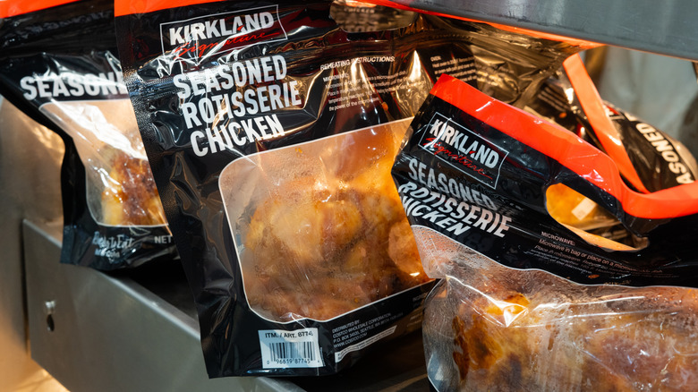 Bags of Costco Kirkland rotisserie chicken in warmer
