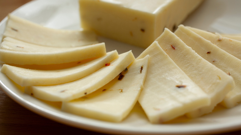 Slices of pepper jack cheese on a plate