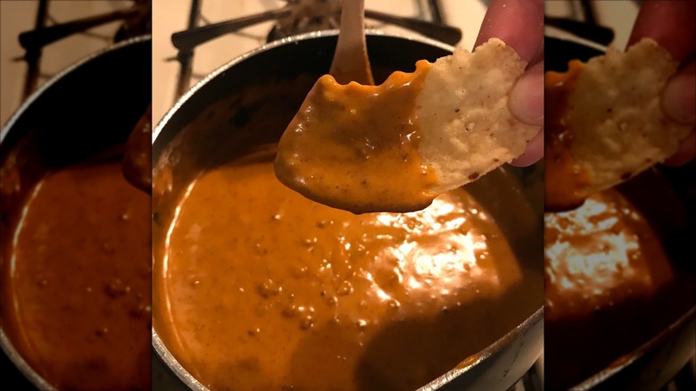 A homemade chili dip with chips