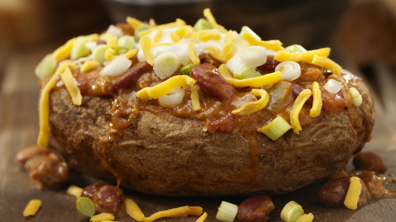 Baked potato with chili on top