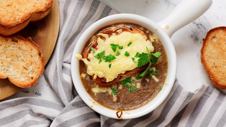 French onion soup topped with a cheesy crouton