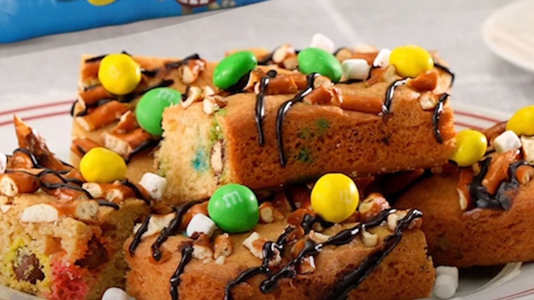 Hand holding M&M blondie