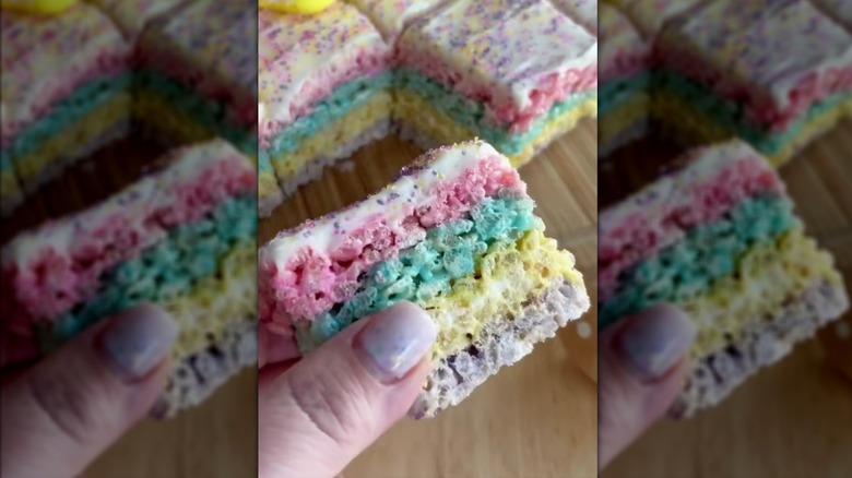 Hand holding pastel-colored Rice Krispies treat