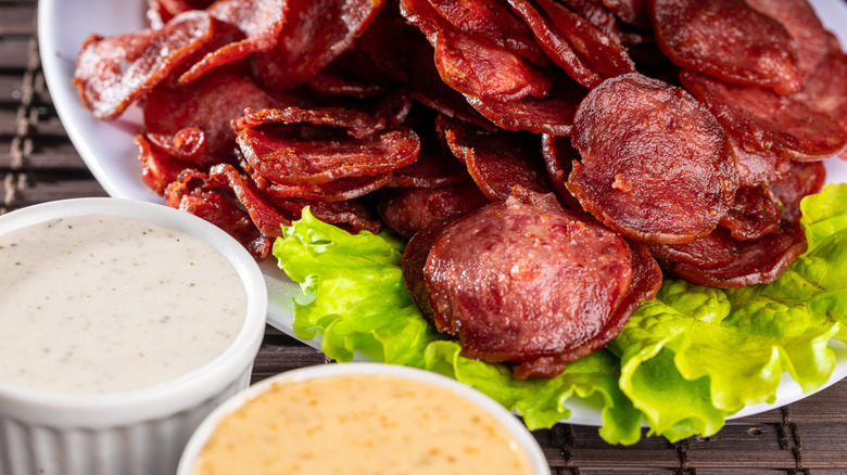 Crispy pepperoni chips served with creamy dipping sauces