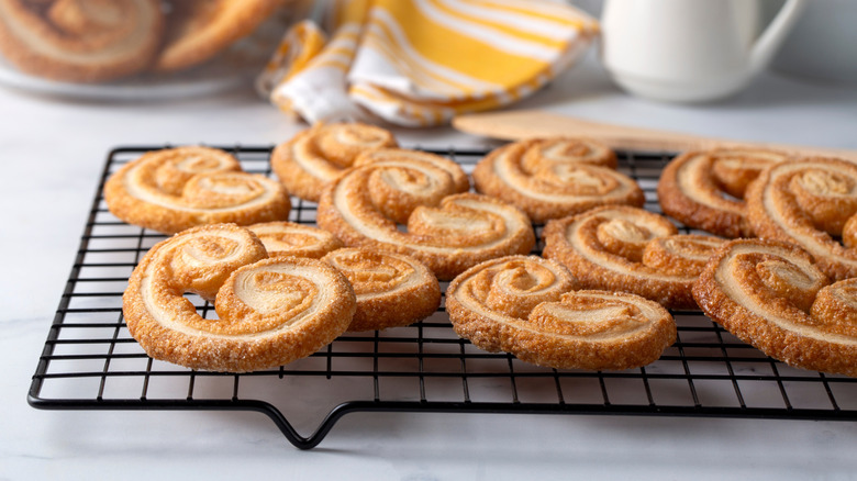 Palmier cookies on wire cooling rack