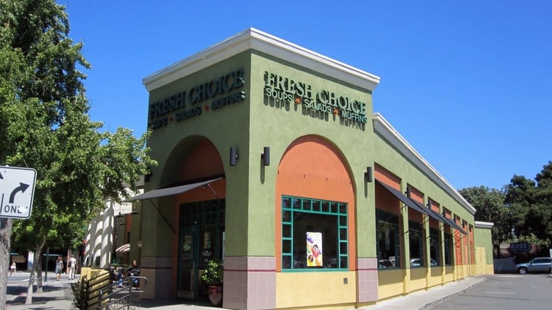 Outside Fresh Choice building with sign on building