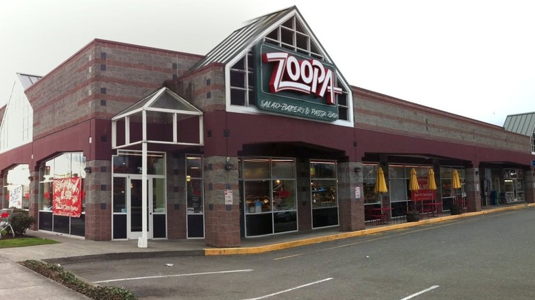 Outside Zoopa building with sign on building