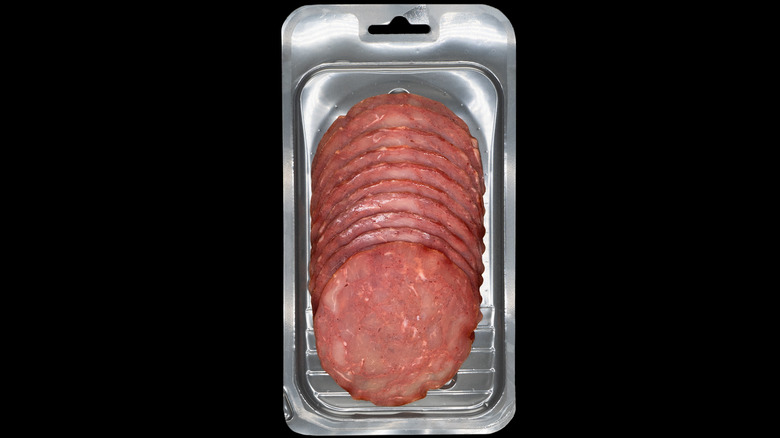 cured beef salami in a plastic package