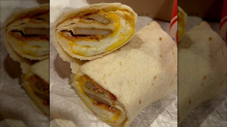 Wendy's breakfast burrito cut in half
