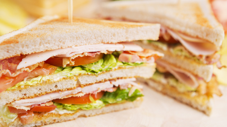 A club sandwich cut in half