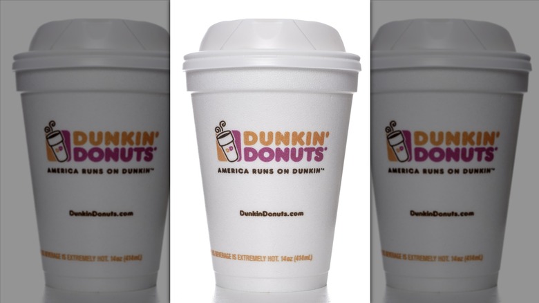 Styrofoam Dunkin' cup on white background