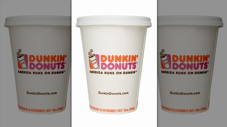 Dunkin' cup for hot drinks on white background