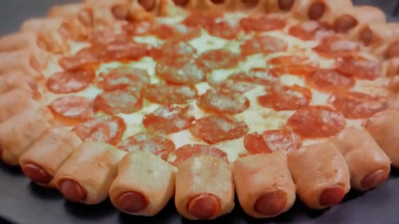 TV commericial for Pizza Hut's Hot Dog Bites pizza, with a mini hot dog crust.