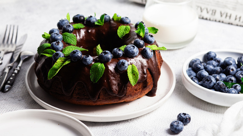 Chocolate Bundt Cake with drizzle and blueberries