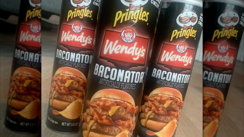 Mirrored image of three Baconator Pringle cans