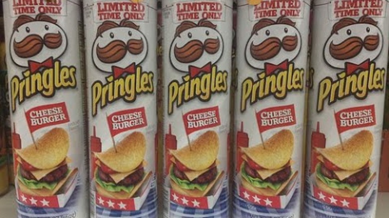 close up of row of Cheese Burger Pringle cans