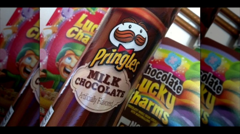 Milk chocolate pringle can in front of Lucky Charms