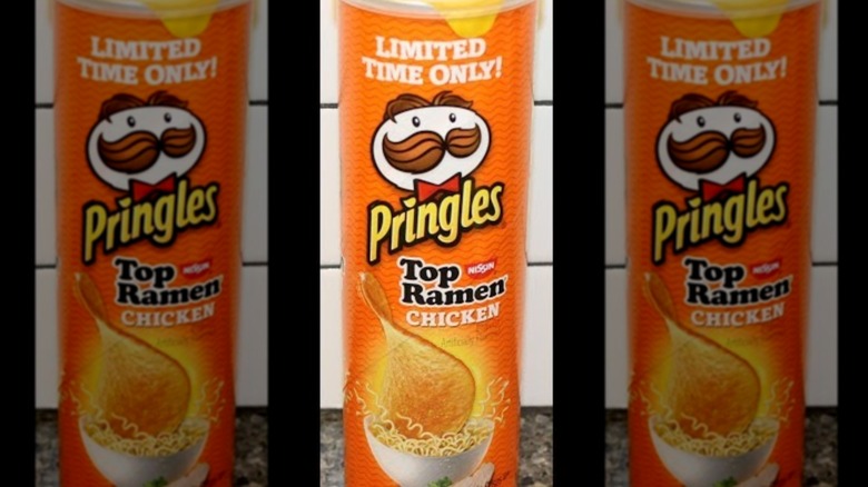 Mirrored image of Pringles Ramen Chicken flavor against kitchen tiles