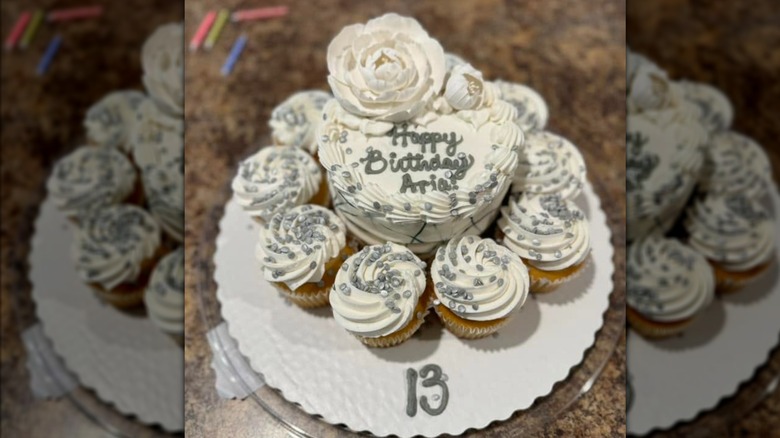 5 and dime cake and cupcakes in white and silver