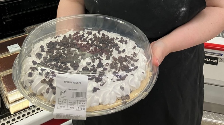 Sam's Club baker holding the original French silk pie
