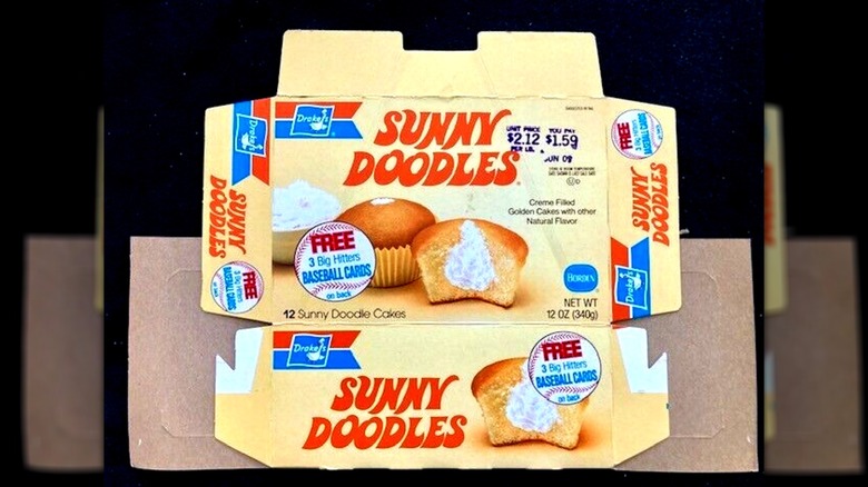 Flattened Drakes Sunny Doodles box against black background