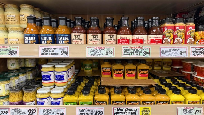 Various condiments on store shelves at Trader Joe's