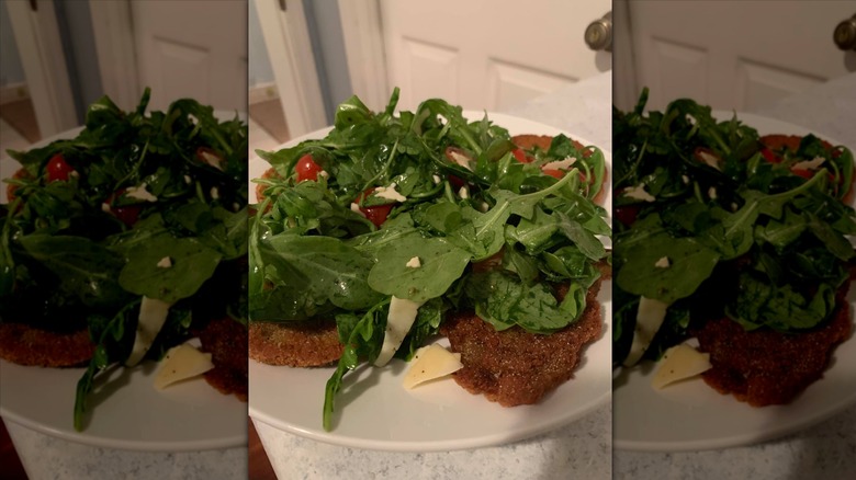 Trader Joe's eggplant cutlets with arugula salad on top