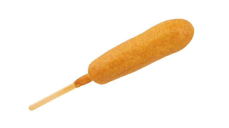 A corn dog isolated on a white background