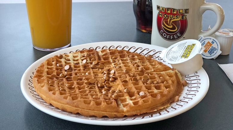 Peanut butter chip waffle on white plate at Waffle House