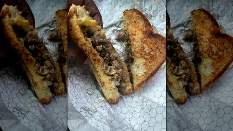 Texas cheesesteak melt on white paper