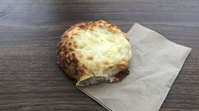 Einstein Bros six cheese bagel on a napkin.