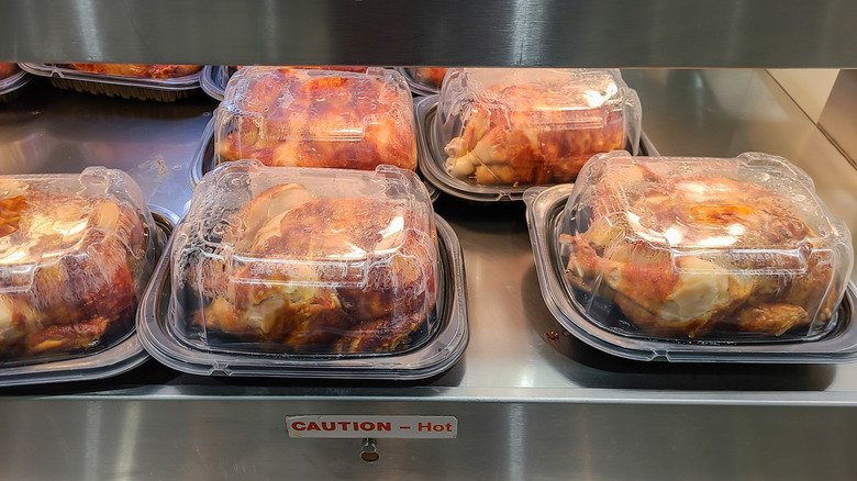 Rotisserie chickens in clamshell packaging at Costco