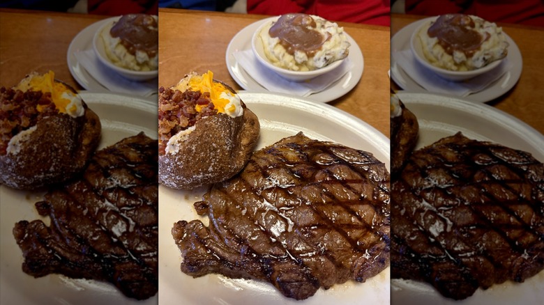 Texas Roadhouse steak on white plate with potato side dishes