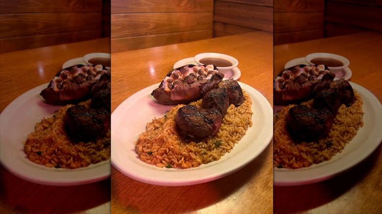 Texas Roadhouse filet medallions on rice with sweet potato