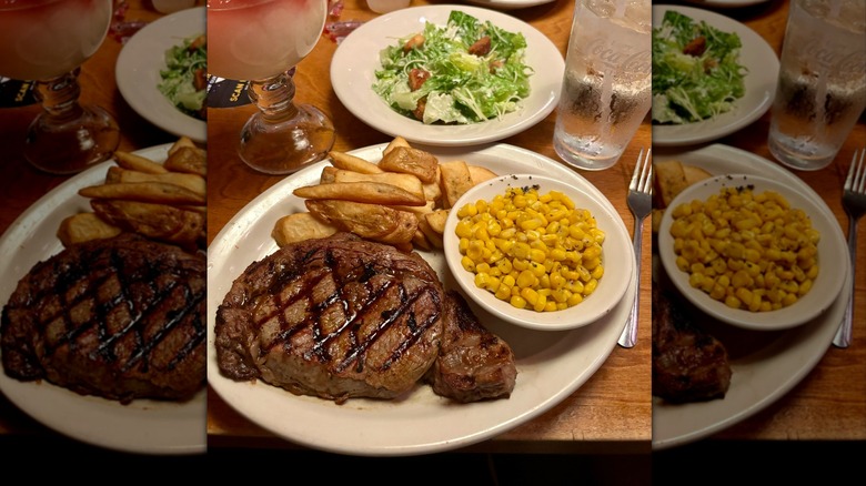 Texas Roadhouse steak on white plate with three side dishes