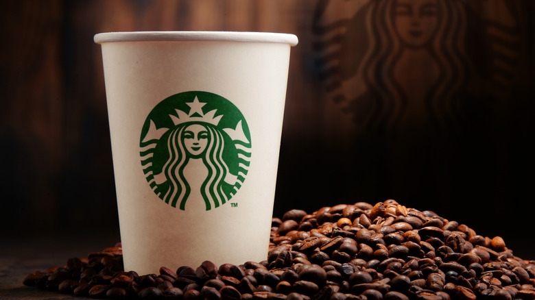 Starbucks cup in roasted beans