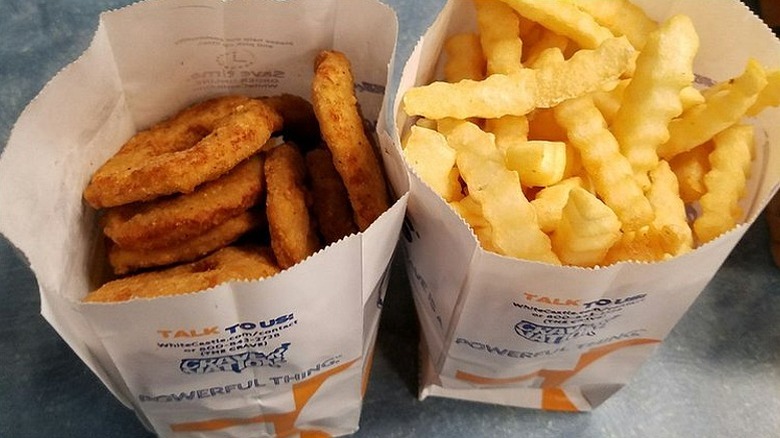 White Castle chicken rings and fries in individual bags.